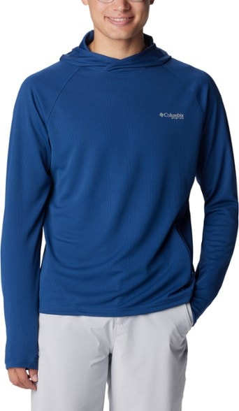 Front view of men's sun protection hoodie worn on a hiking trail