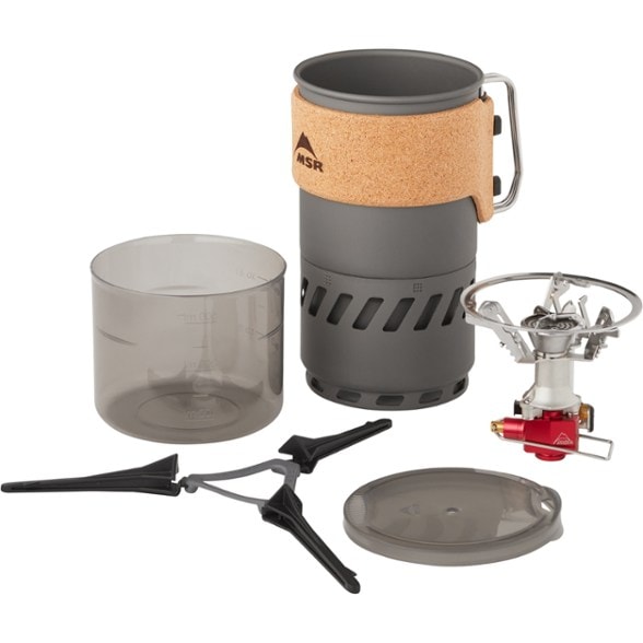 Versatile Switch Camping Stove in action at a campsite, showing integrated pot and flame.