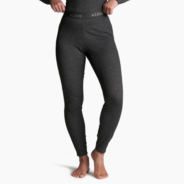 KÜHL Reactiv Lite thermal leggings displayed outdoors, showcasing moisture-wicking technology