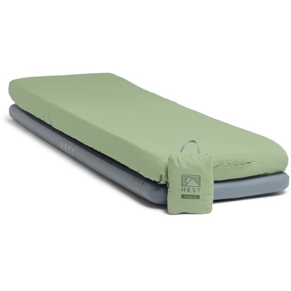 Overhead view of jade-infused HEST ChillLayer fitted sheet stretched across memory foam mattress