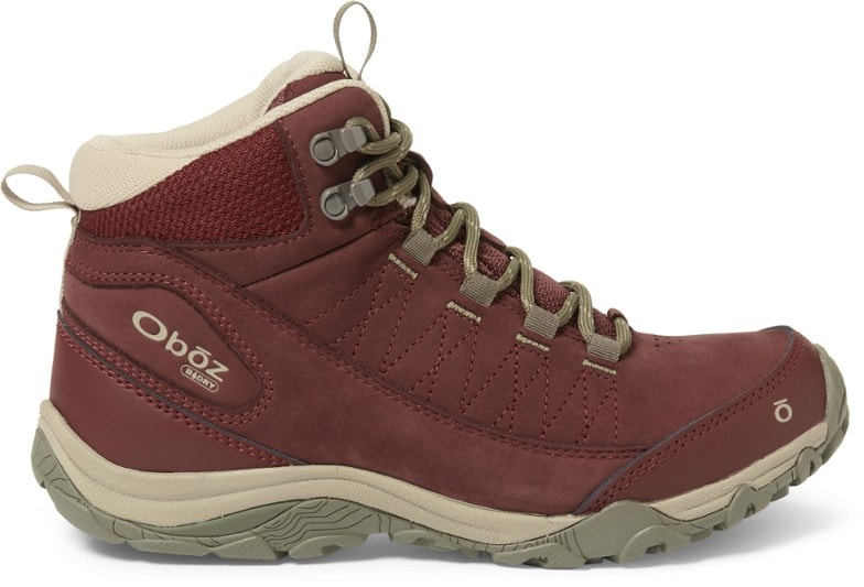 Side view of Oboz Ousel Mid Women's Waterproof Hiking Boots on rocky terrain.