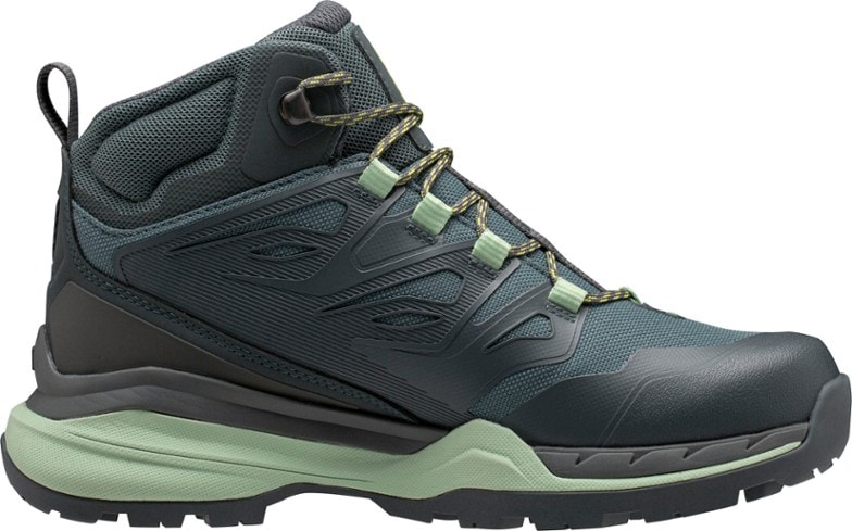 Side view of Helly Hansen Women's Traverse Eco Waterproof Hiking Boots on rocky terrain.