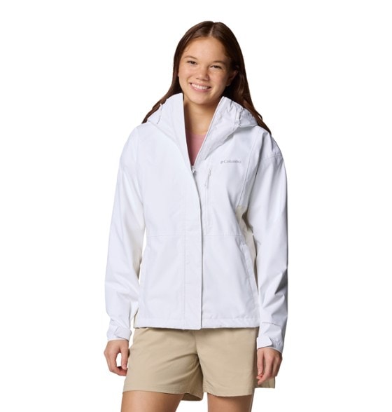 Columbia women's Hikebound II rain jacket showcasing its waterproof features on a hiking trail.