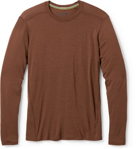Men's merino wool base layer top showcasing its lightweight fabric and fit.