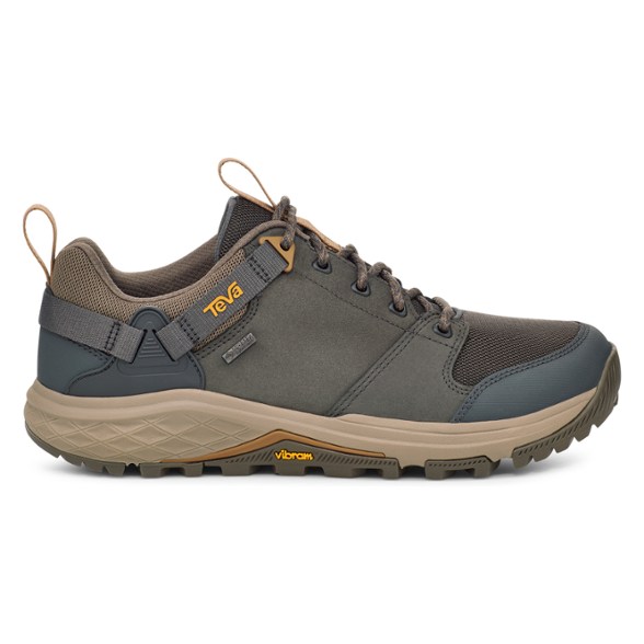 Teva Grandview GTX Low hiking shoes from the side, showcasing the waterproof leather and GORE-TEX membrane.