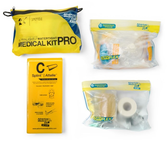 Adventure Medical Kits Ultralight Pro Medical Kit displayed outdoors, showcasing its compact design.