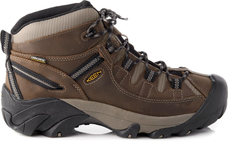 Side view of KEEN Targhee II Mid Men's Waterproof Hiking Boots on a rocky trail.