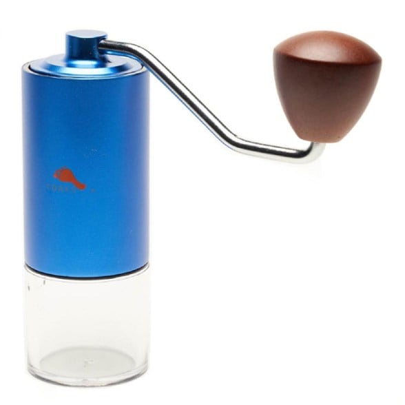 Side view of TOAKS Voyager portable coffee grinder showing wooden handle and stainless steel body