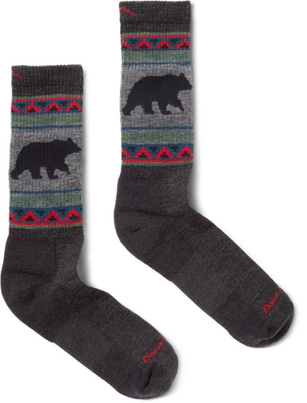 Darn Tough Van Grizzle boot socks on a rocky trail, showcasing their durability and comfort.