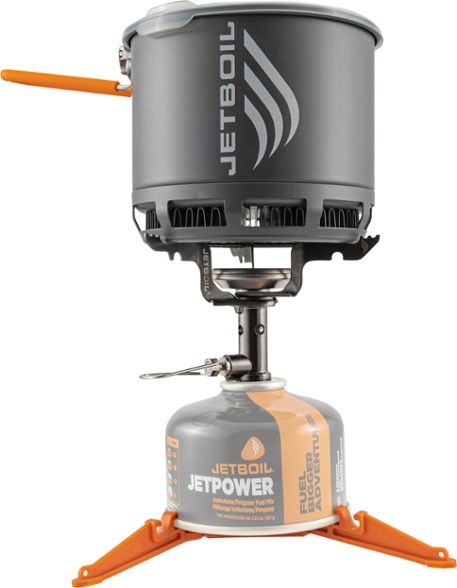 Jetboil Stash cooking system showcasing the titanium burner and pot from an angled view.