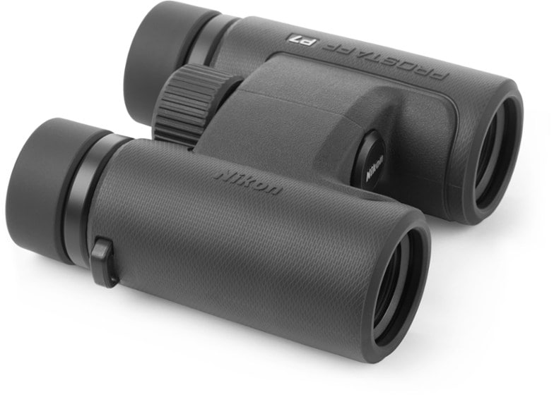 Nikon Prostaff P7 10x30 binoculars on a hiking trail, perfect for wildlife viewing.