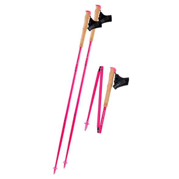 Close-up of ultra-light carbon trekking poles on rugged terrain, emphasizing their durable tips.
