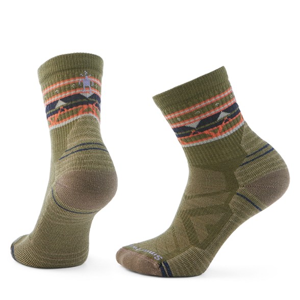 Smartwool women's light cushion hiking socks on a trail.