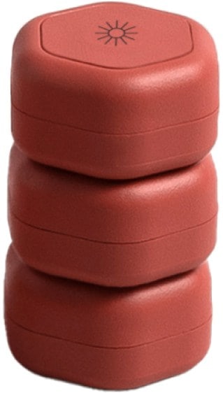 Close-up of labeled Cadence capsules for cleanser, moisturizer, and sunscreen, part of TSA skincare essentials.