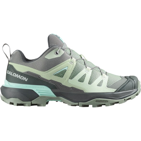 Side view of TerraFlex Ultra women's trail shoes showing quicklace system and ankle support on rocky terrain