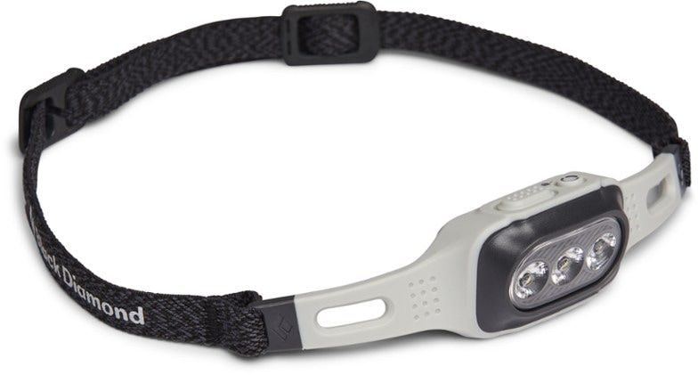 Front view of the Black Diamond Flex 325 headlamp showcasing its adjustable beam feature.
