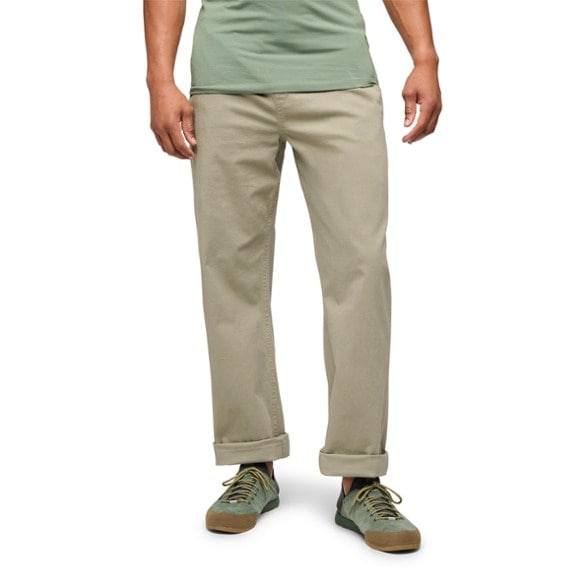 Front view of men's climbing pants with pockets, designed for outdoor activities.
