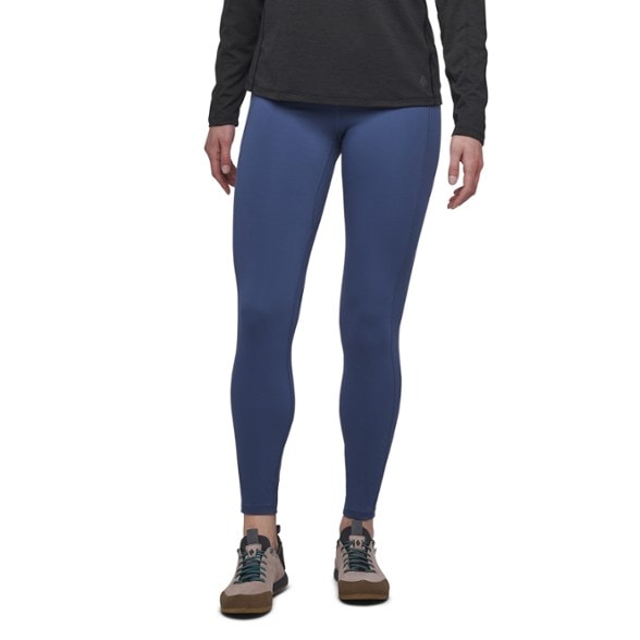 Elevate Women's leggings shown in action during a mountain run, highlighting breathability and comfort.