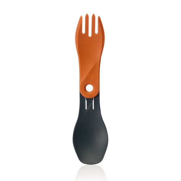 EcoSpork Pro in a hiking backpack, demonstrating its compact size and travel-friendly design.