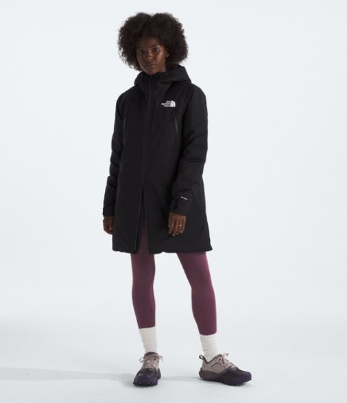Front view of Women's Eco-Friendly Down Parka in a snowy landscape.