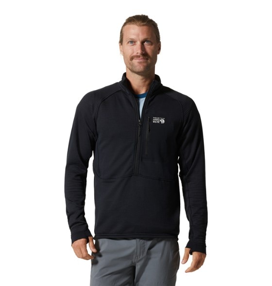 Front view of men's fleece pullover worn during ski touring in alpine conditions