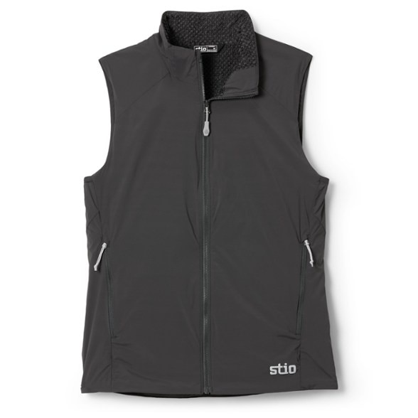 Dawner women's packable insulated vest in action during a hike, showcasing its stylish design and warmth.