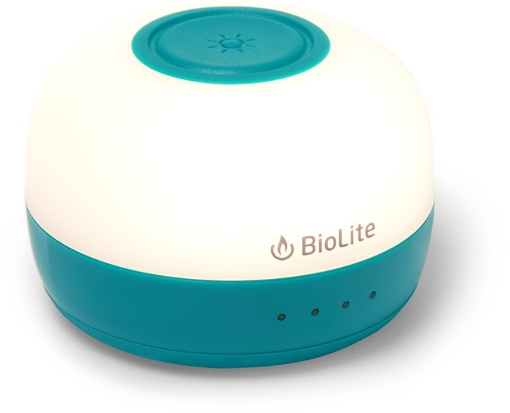 BioLite AlpenGlow Mini Lantern illuminating a campsite with warm light