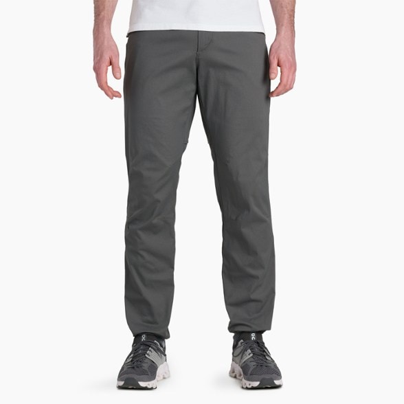 KÜHL Resistor Air lightweight hiking pants shown in outdoor setting, highlighting zippered thigh vents.