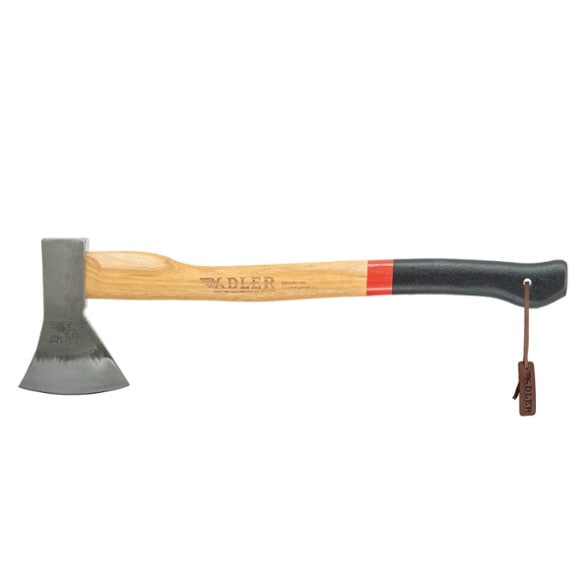 Side view of the portable axe on forest ground, showcasing the hickory handle and compact blade.