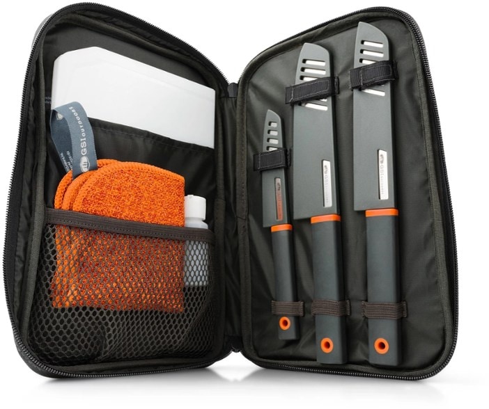 Top view of TrailMaster santoku knife set with sheaths and folding cutting board, perfect for camping and kitchen use