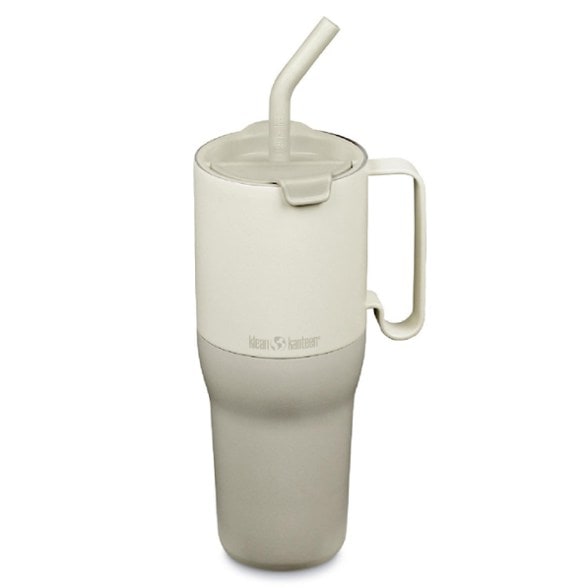 EcoRise tumbler in use outdoors, showcasing its large capacity and straw.