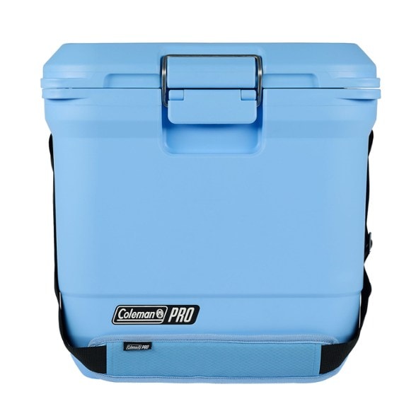 TrailPro 25 quart cooler with padded strap shown on a hiking trail packed with camping gear