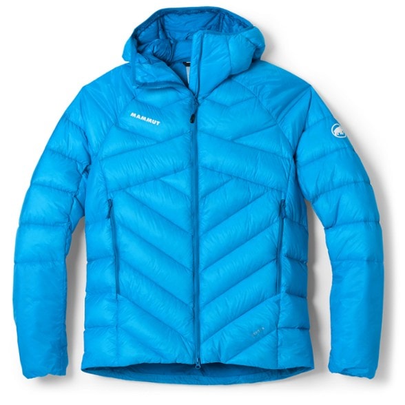 Taiss UltraLite Insulated Down Jacket shown in a snowy mountain setting, ideal for winter hiking.