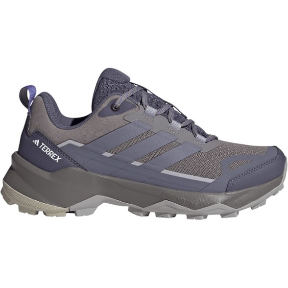 Side view of Adidas women's hiking footwear showing gusseted tongue and ripstop texture