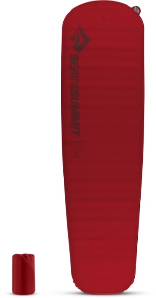 Luxury Comfort Plus self-inflating sleeping pad from the side, showcasing its thickness and fabric.