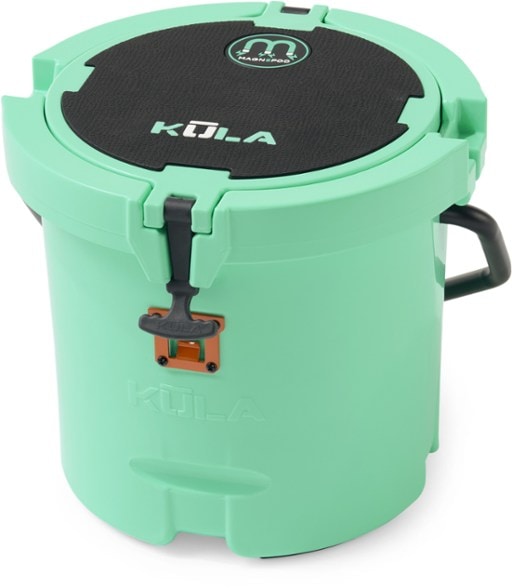 KULA 5 MagnePod portable cooler seat shown on a fishing boat with rod holders in use