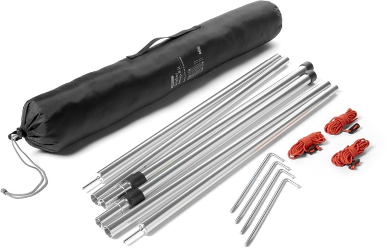 Adjustable poles of the Versatile Shelter Setup Kit in use at a campsite.