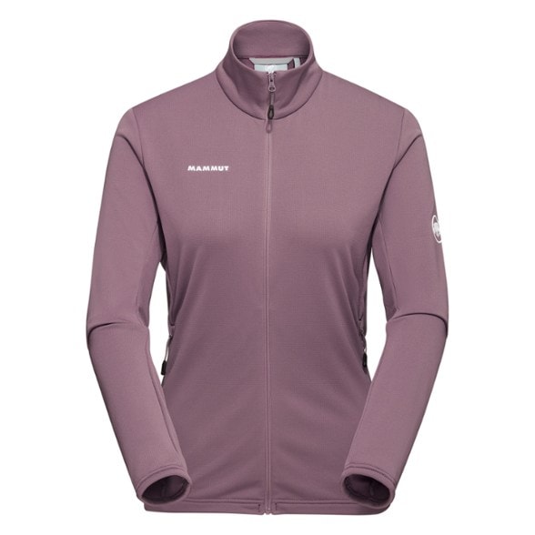 Mammut Women's Aconcagua Lightweight Fleece Jacket in action on a hike, showcasing its breathability and comfort.