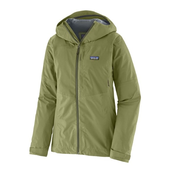 Patagonia Boulder Fork rain jacket on a hiking trail, showcasing durability and style.