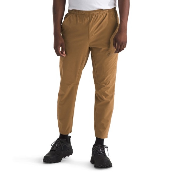 Front view of lightweight outdoor pants with water repellent fabric and tapered leg design