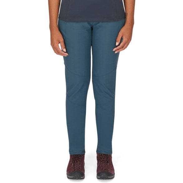 Rab Women's Summer Adventure Pants in action during a sunny hike, showcasing breathability and flexibility.