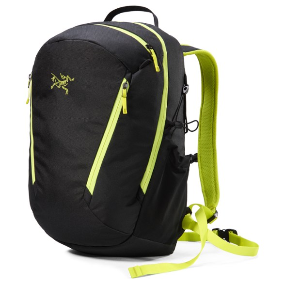 Mantis 26L backpack in use at a park, showcasing its spacious design and external pockets for water bottles.