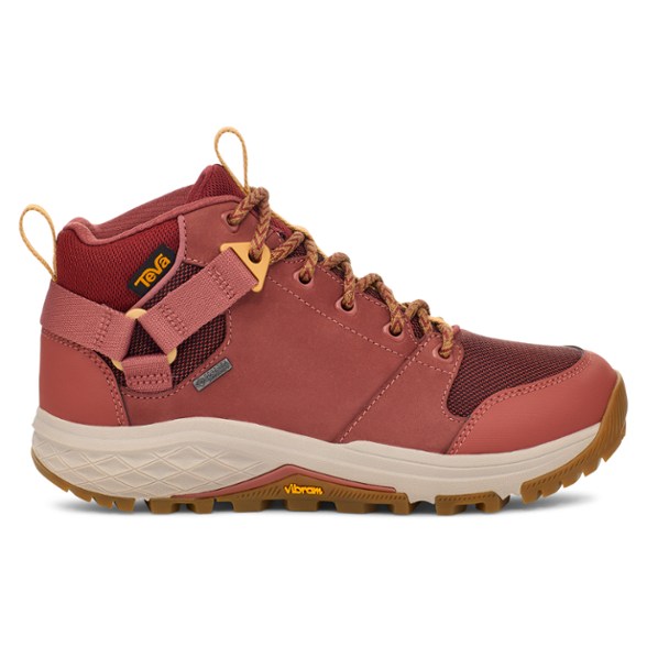 Teva Grandview GTX women's hiking boots in action on a mountain trail.