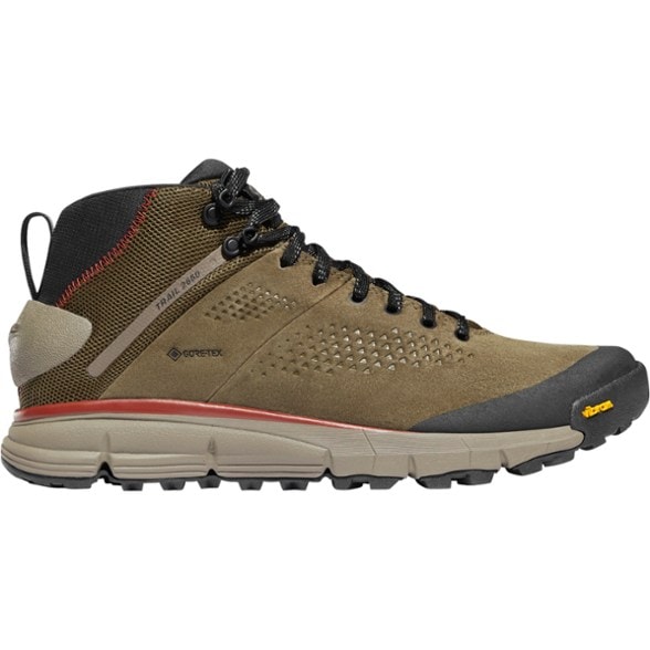 Danner Trail 2650 Mid GTX Men's Hiking Boots in action on a rugged trail with a focus on the waterproof design.