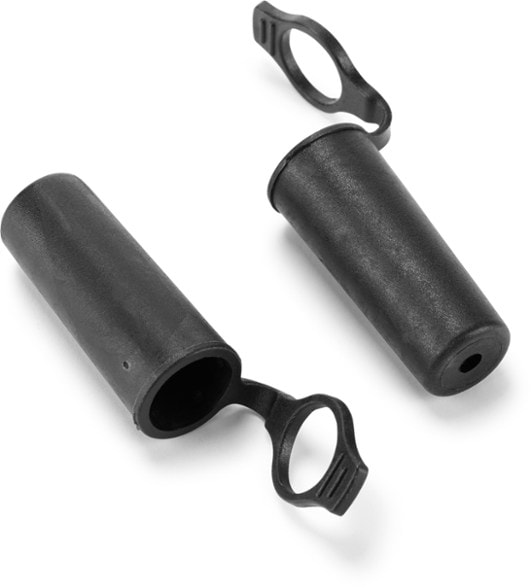 Trekking pole tip protectors on hiking poles, showcasing their protective features.
