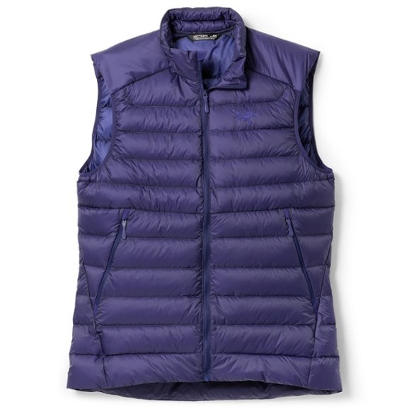 Men's lightweight insulated down vest showcasing its breathable fabric and packable design.