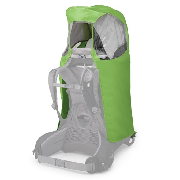 Osprey Poco rain cover with clear windows showing a child inside, hiking in the rain.