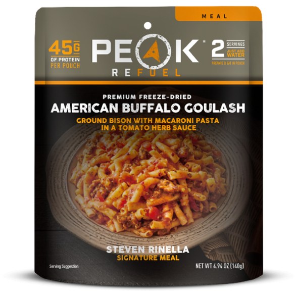 Front view of PeakBison Trail Goulash packaging on a rocky trail