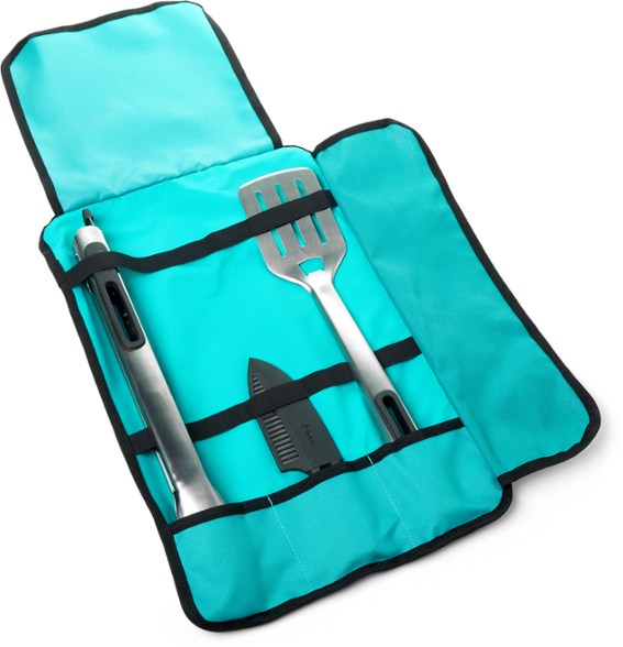 Detailed view of the Ultimate Grilling and Fire Pit Tool Kit with spatula, tongs, and knife.