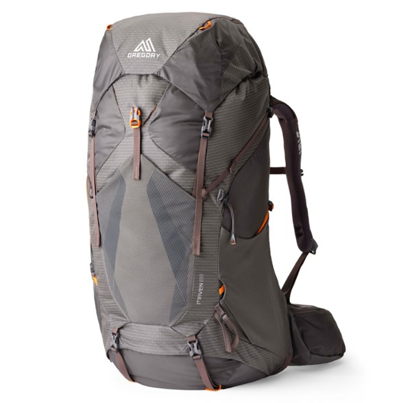 Front view of MavenTrail 68L trekking backpack resting on rocky terrain